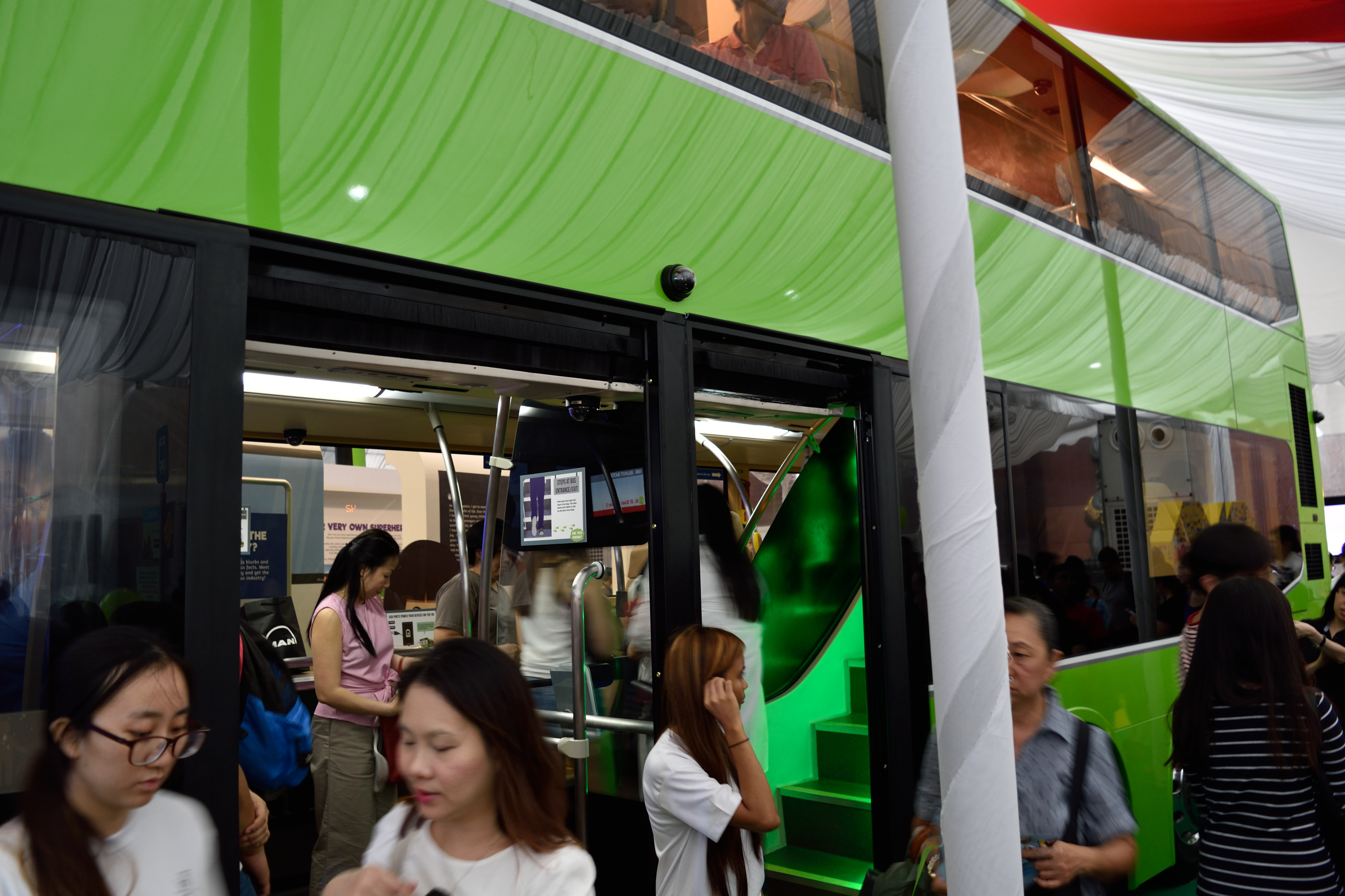 The third door of Bus B is right next to the middle door.